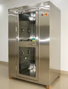 Stainless steel cleanroom air shower with hinged access door used in pharmaceutical and cleanroom facilities